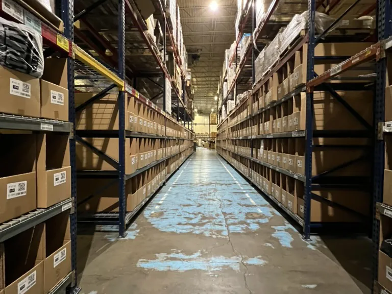 A picking aisle in the Orderfy warehouse